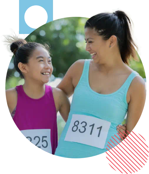 adult and child at charity marathon