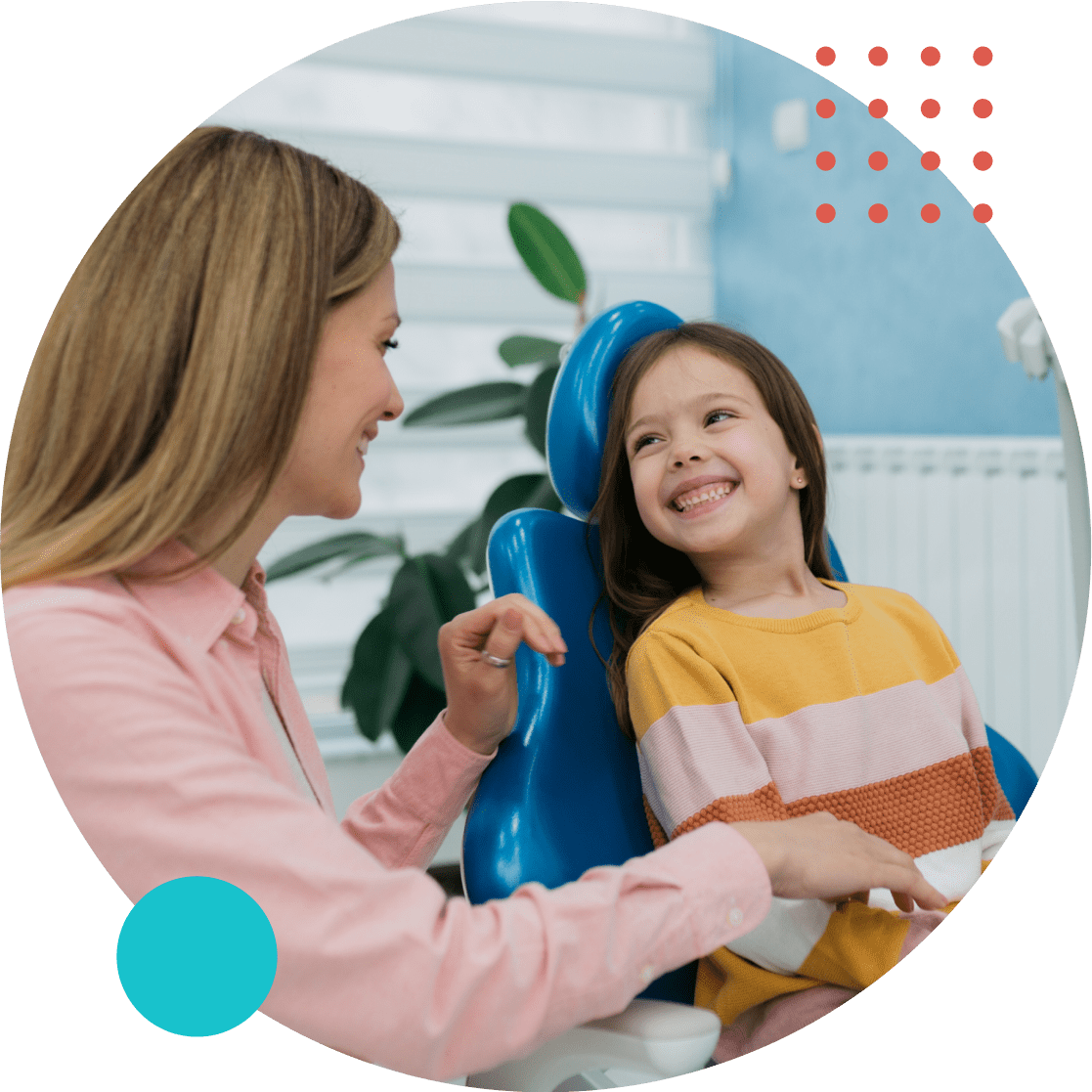Mother and young daughter smiling at dentist office